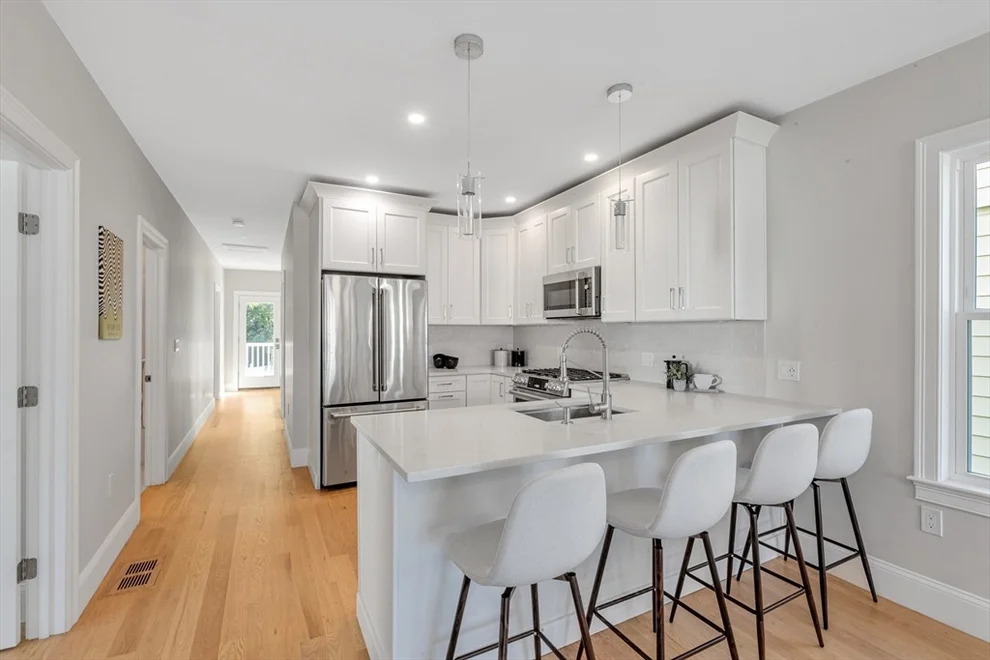Unit for sale at 103 Neponset Ave, Boston, MA 02131
