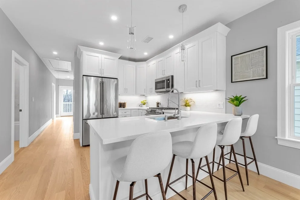 Unit for sale at 105 Neponset Ave, Boston, MA 02131