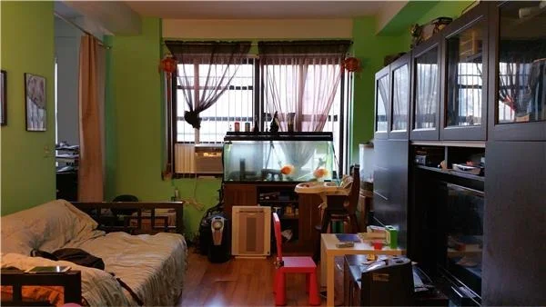 Unit for sale at 99-40 63rd Drive, Queens, NY 11374