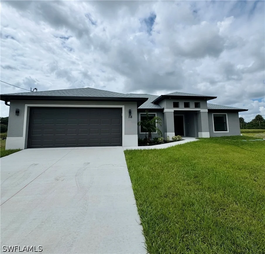 Unit for sale at 118 Parish Drive, Lehigh Acres, FL 33974