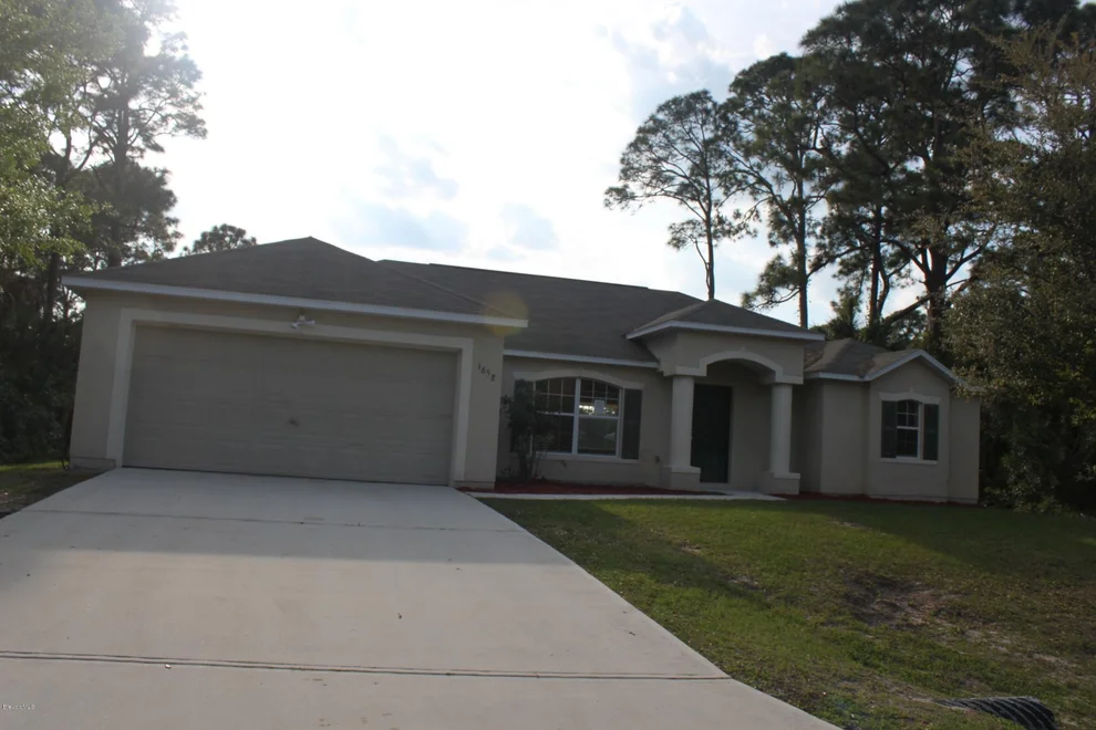 Unit for sale at 1658 NW Red Bud Circle, Palm Bay, FL 32907