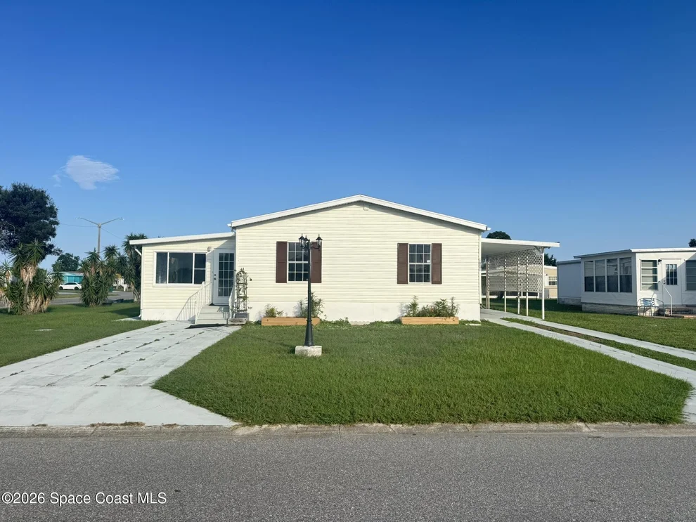 Unit for sale at 1001 Waterway Drive, Barefoot Bay, FL 32976